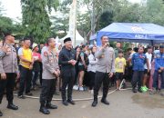 Polres Lebak Adakan Lomba Panjat Pinang Meriahkan HUT Bhayangkara Ke-79.