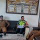 Babinsa Koramil 06/Bukit Komsos Dengan Aparatur Desa Guna Mengecek Data Penerima Bantuan Pangan Beras