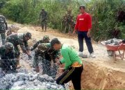 Satgas TMMD Ke-126 Bersama Warga Kebut Pemasangan Batu Bronjong Di Lokasi Sasaran