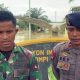 Wujud Sinergitas TNI–Polri, Bersihkan Material Sisa Banjir di Mako Kompi Senapan A Aceh Tamiang