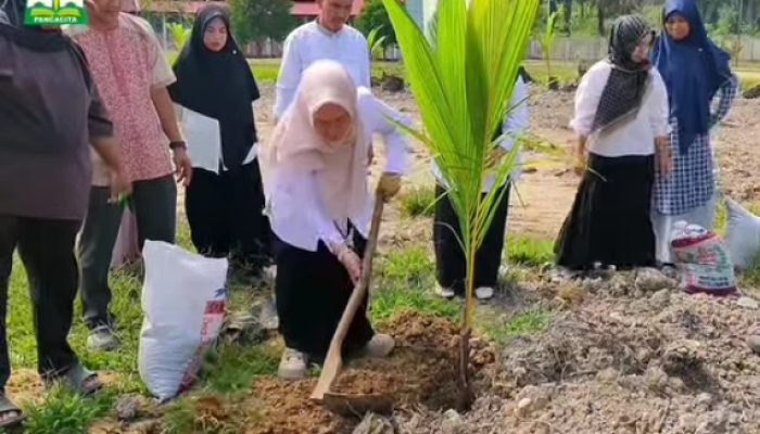 HARAPAN BARU DARI GERAKAN HIJAU DI SMA NEGERI UNGGUL: PENANAMAN POHON SEBAGAI WARISAN MASA DEPAN